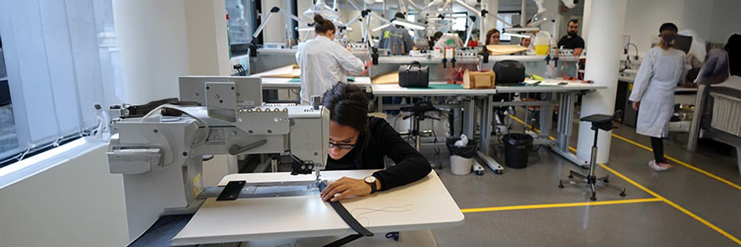 Woman working on a sewing machine